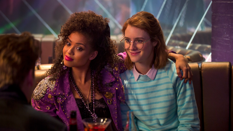 Gugu Mbatha-Raw and Mackenzie Davis dress for the eighties in a still from Black Mirror’s San Junipero episode.
