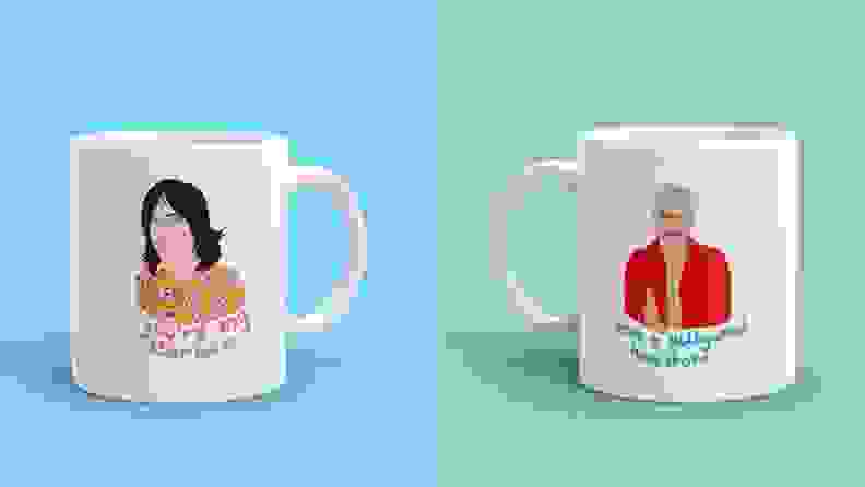 A pair of Great British Bake-Off coffee mugs. "Your my star baker," the one on the left reads. The one on the right says, "Have a Hollywood handshake."