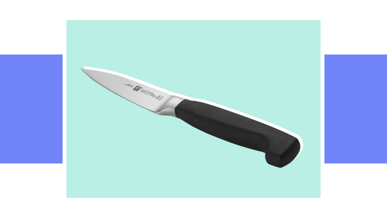 An image of a small-bladed paring knife with a black handle.