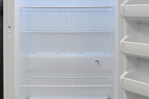 Five distinct shelving areas inside the Frigidaire FFFH17F2QW provide ample room for frozen food.