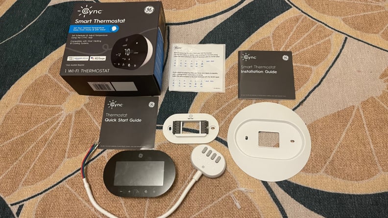 The contents of what's included with the Cync smart thermostat