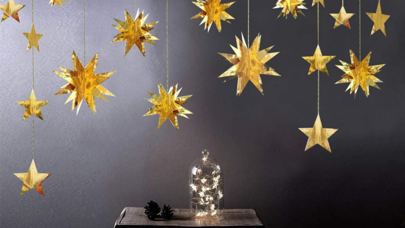 Decorative star garland against a black background.