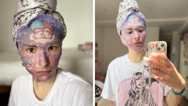 Person wears The Crème Shop's Printed Sheet Masks on face and a hair wrap on head while posing for a mirror picture with their smartphone in hand.