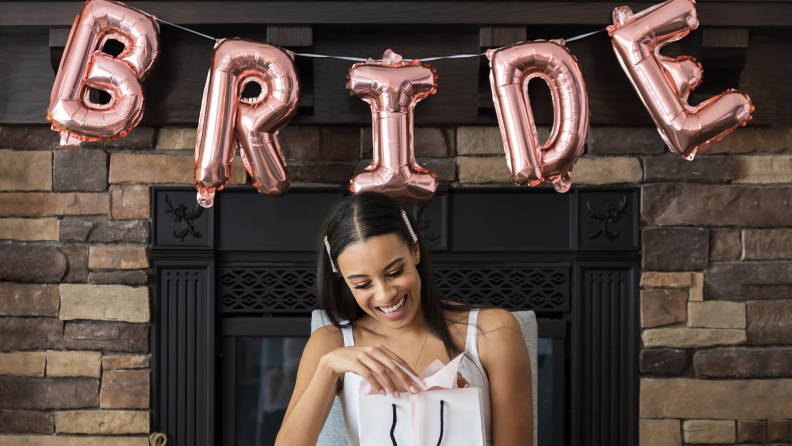 A bride opening gifts.