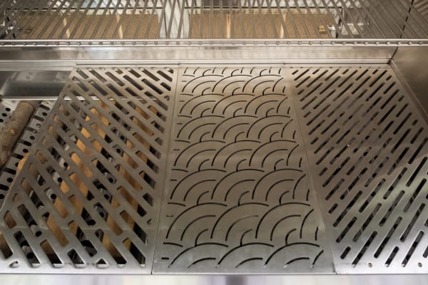 Kalamazoo's grills come with three stainless-steel cooking grates: one for meat, one for fish, and one for veggies. Each is designed for optimal cooking and minimal sticking.