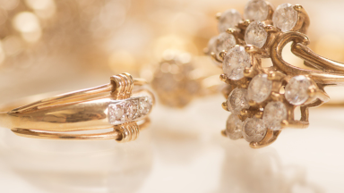 Two diamond rings in golden lighting