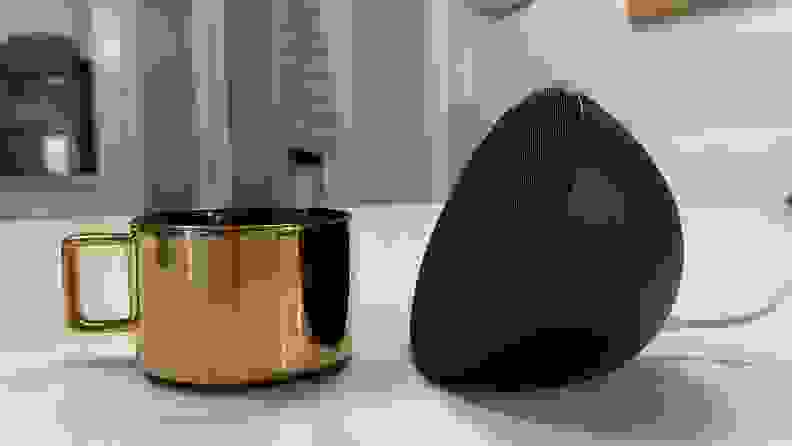 The Echo Pop next to a small Espresso cup