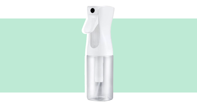 Clear and white misting spray bottle.