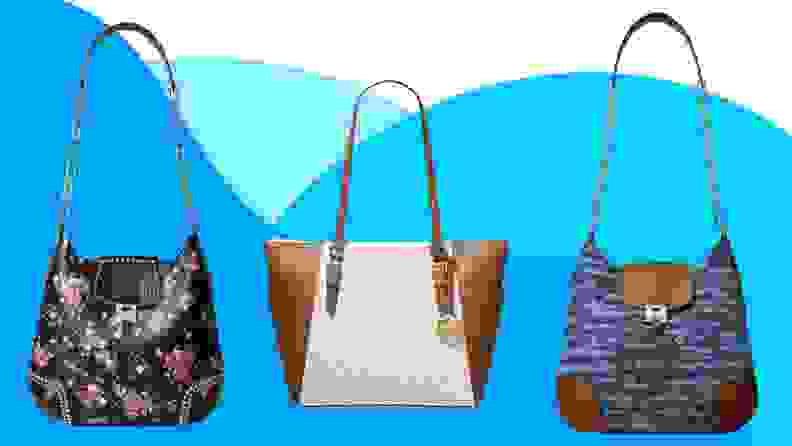 Three Michael Kors shoulder bags in front of blue background.