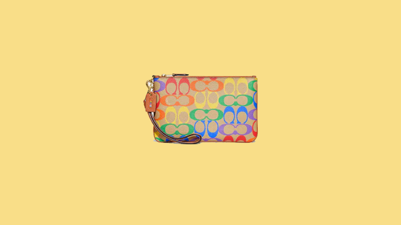 rainbow printed wristlet on yellow background