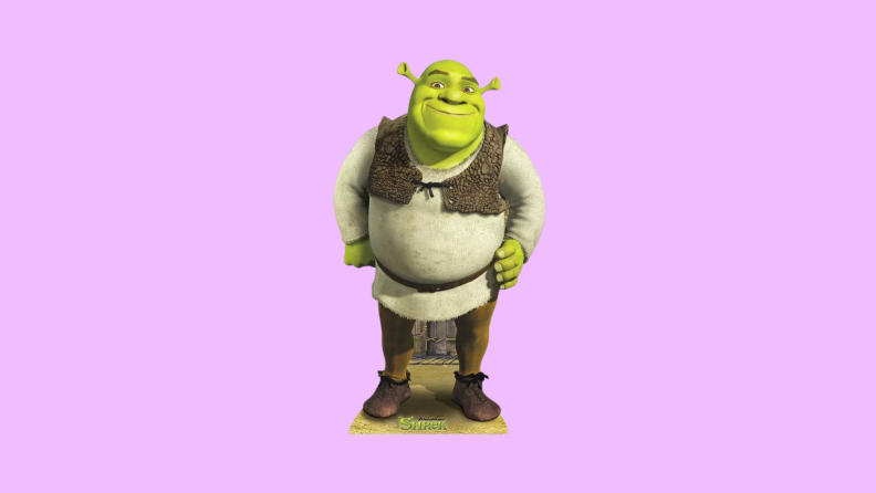 A Shrek cutout in front of a background.