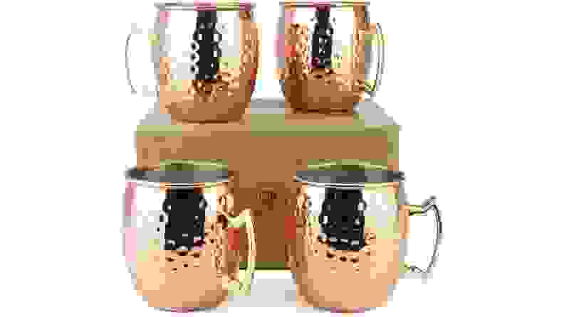 A set of 4 copper mugs