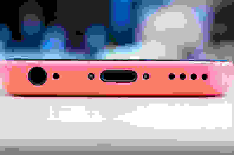 A photo of the Apple iPhone 5c's lightning port, speakers, and headphone jack.