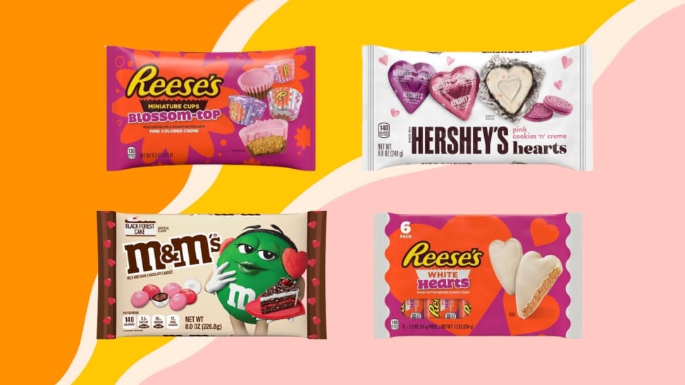 Reese's blossom-top mini cups, Hershey's Cookies 'N' Cream hearts, Reese's White Creme Hearts, and Black Forests M&M's all in their packaging on a pink, orange, and yellow background