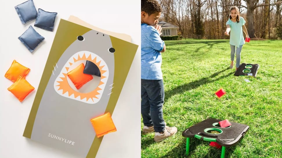 On one side is a shark-themed cornhole board with blue and yellow beanbags. On the other side two children play a game of cornhole on a collapsible set.