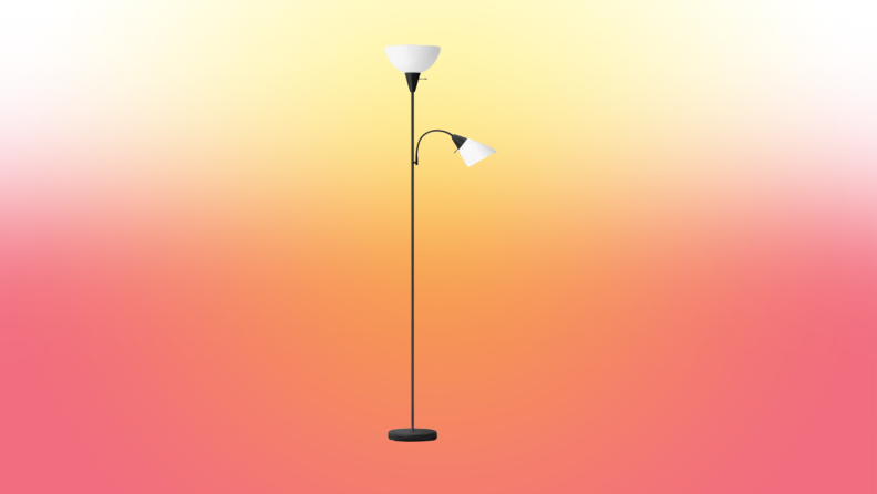 A lamp stands on a red and yellow fade background