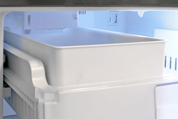 The LG LDCS24223S's unobtrusive ice maker is found tucked away into the ceiling of the freezer. There's a basic on/off switch that turns it... well, on or off.