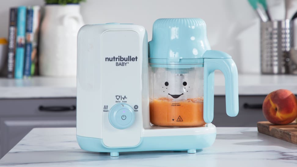 The Nutribullet Baby Steam + Blend on a counter.