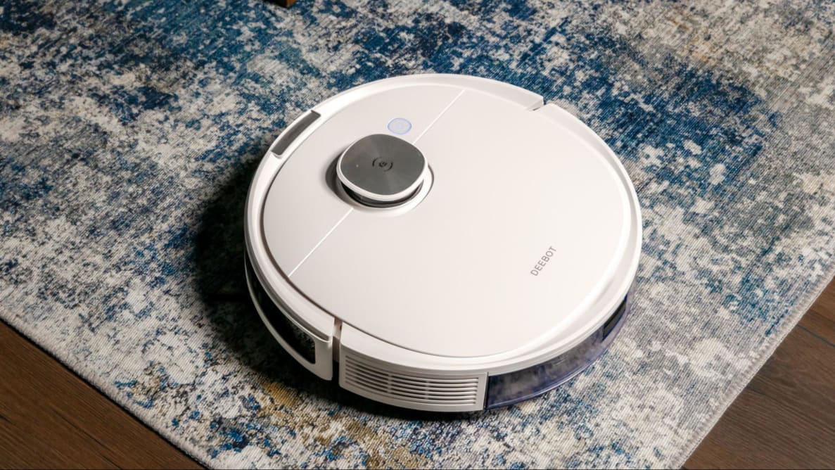 The Evocas Deebot N10 Plus sitting on a blue and white rug