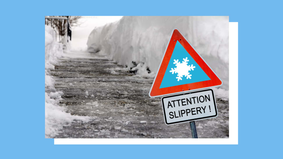 An icy path with a sign against a blue background.