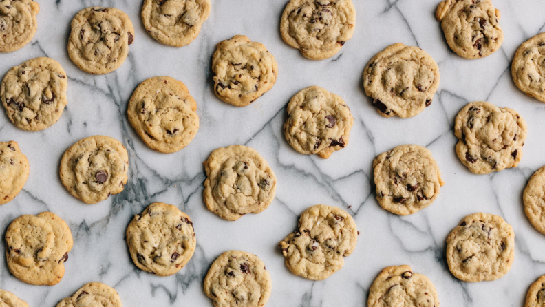 A bunch of cookies on a marble board