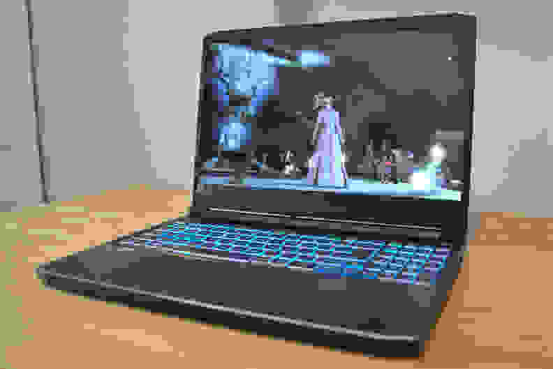 An Acer Predator Helios 300 gaming laptop on a desk.