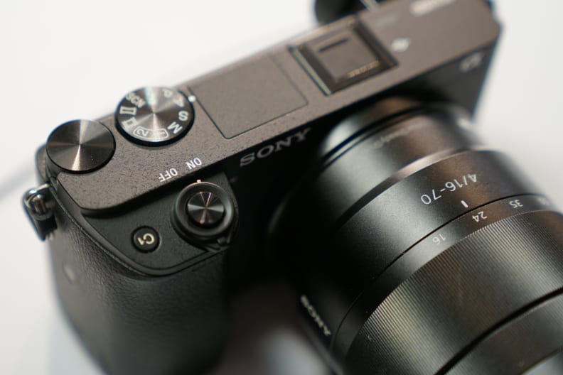 A gently resculpted front grip makes the A6300 relatively easy to hold onto.