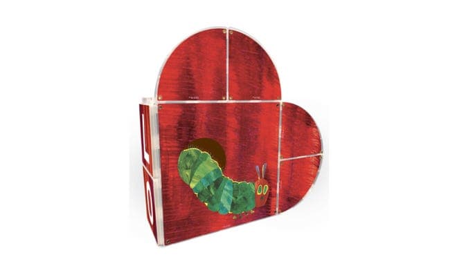 Red magna-tiles in the shape of a heart with cartoon green caterpillar on front.