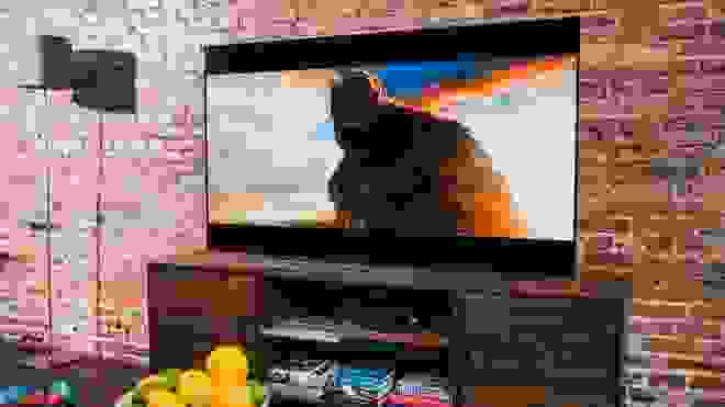 Flatscreen TV with giant gorilla on it