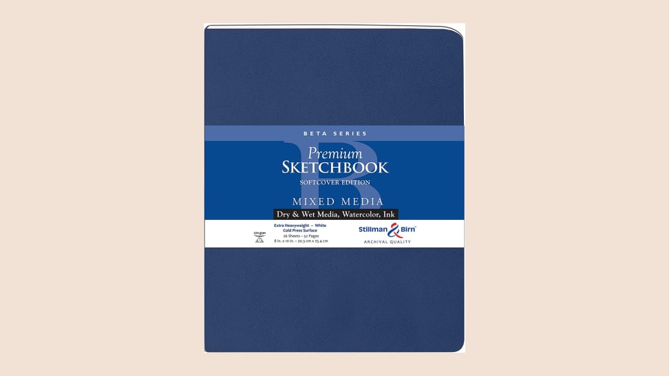 A blue sketchbook on a tan background.