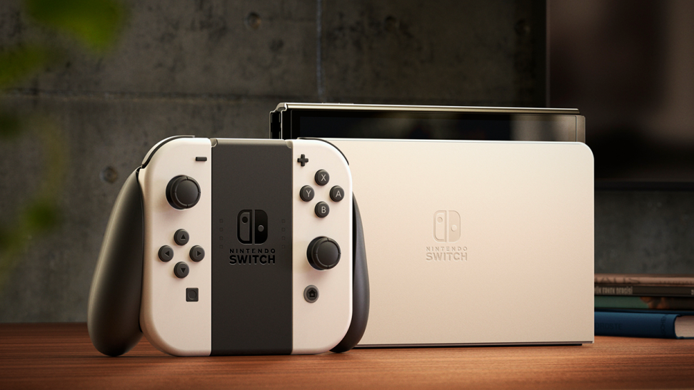 Close-up photo of the white-and-black Nintendo Switch OLED Model.