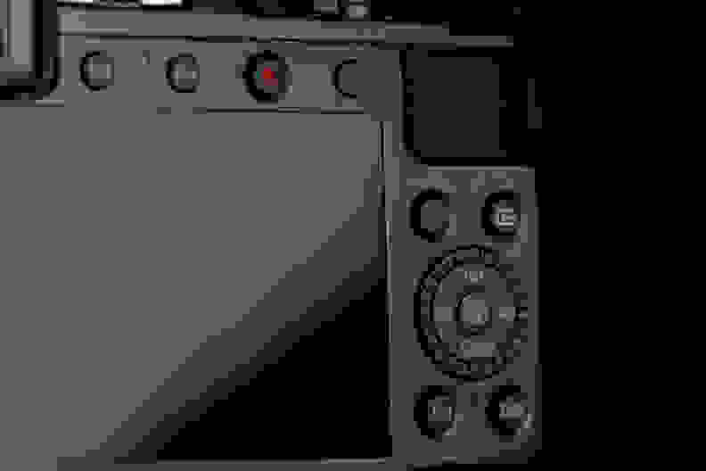 A photograph of the Panasonic Lumix LX100's rear controls.