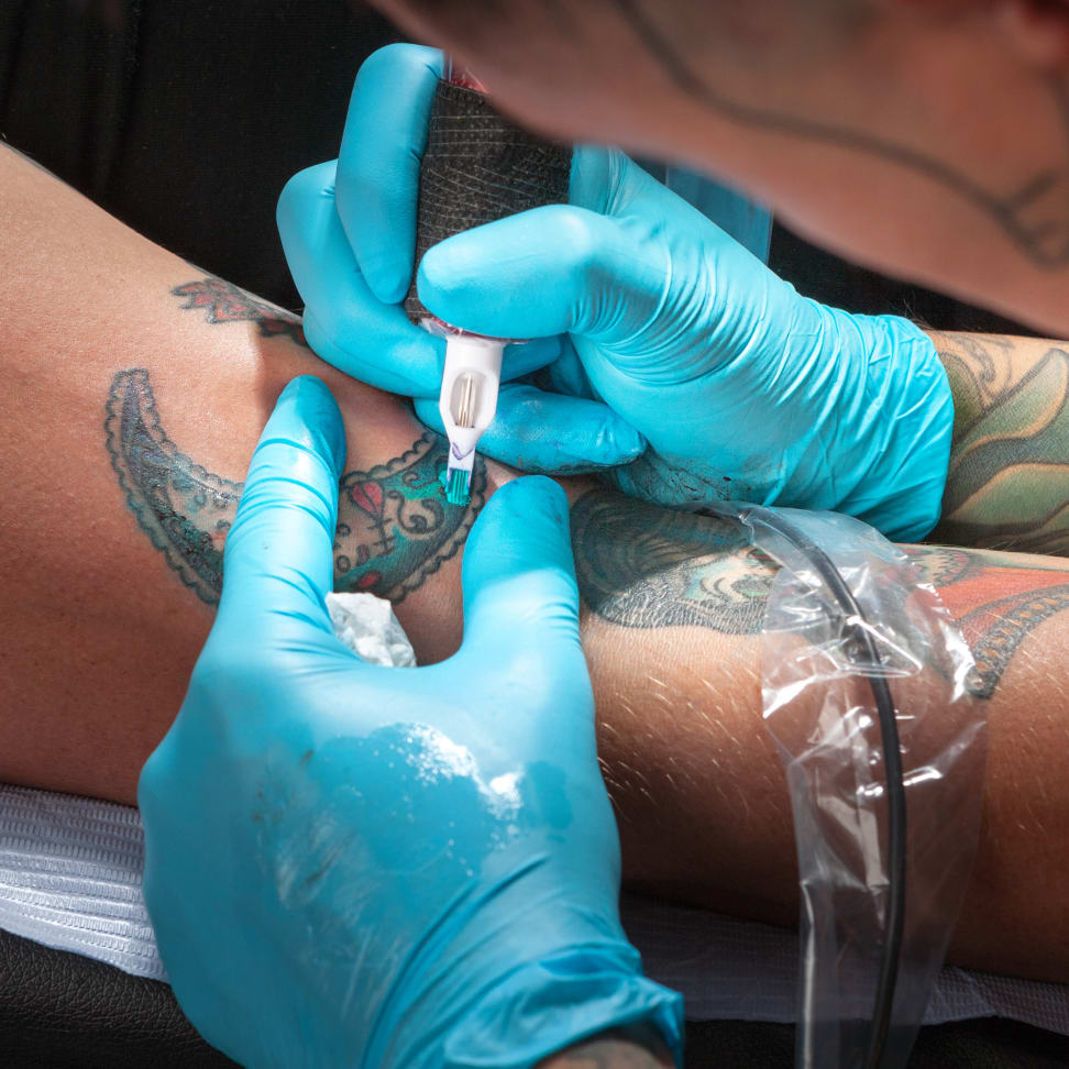 TattooistAssociated Tattoo Complications Overworked Tattoo Pigment  Overload and Infections Producing Early and Late Adverse Events  Semantic  Scholar