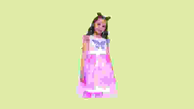 A child modeling a light-up butterfly skirt.