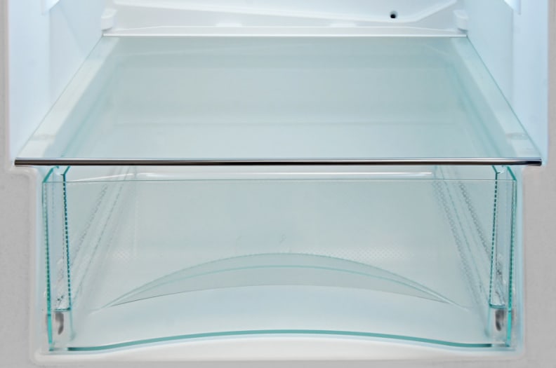 A close-up of the glass crisper drawer on the Liebherr CS1360.