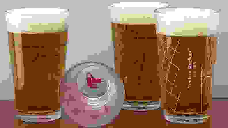 Baseball themed glasses filled with beer.