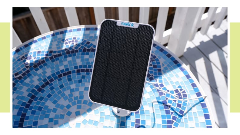A Reolink solar panel outside in the sun.