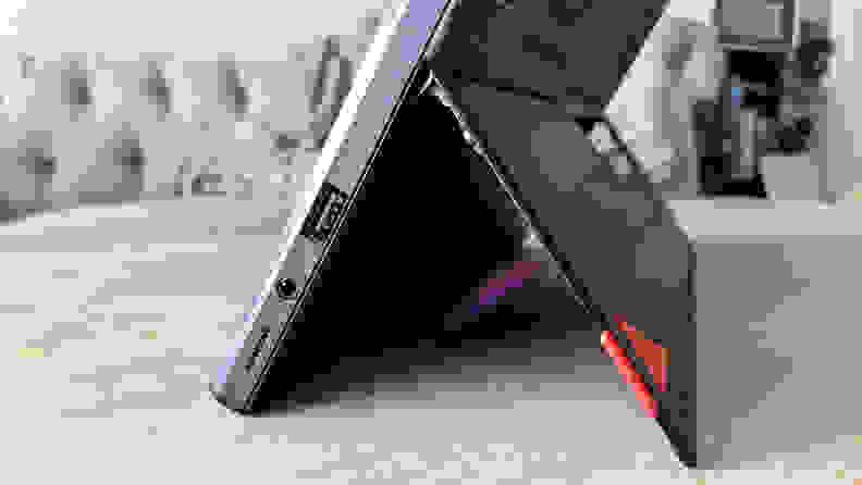 A side view of a tablet held up by its kickstand