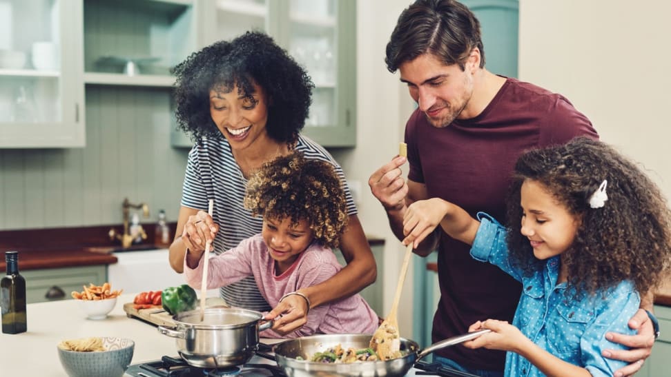 Family cooking dinner together