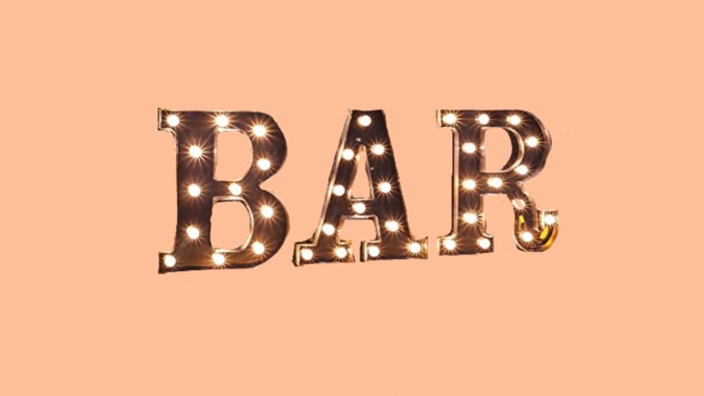 glowing marquee letter that says BAR