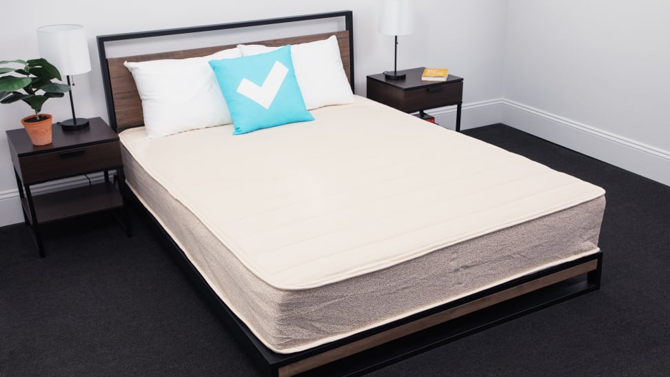 Angled photo of the Birch Natural Mattress in a model room.