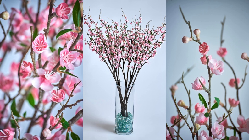 Close ups of fake cherry blossoms in a vase.