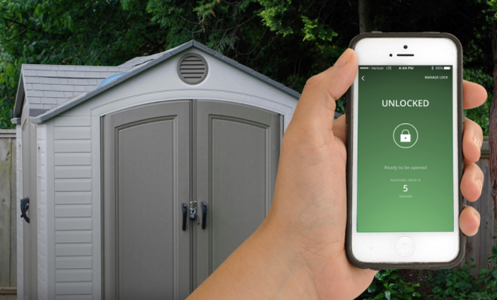 Master Lock Outdoor Padlock on a shed with the mobile app on a phone