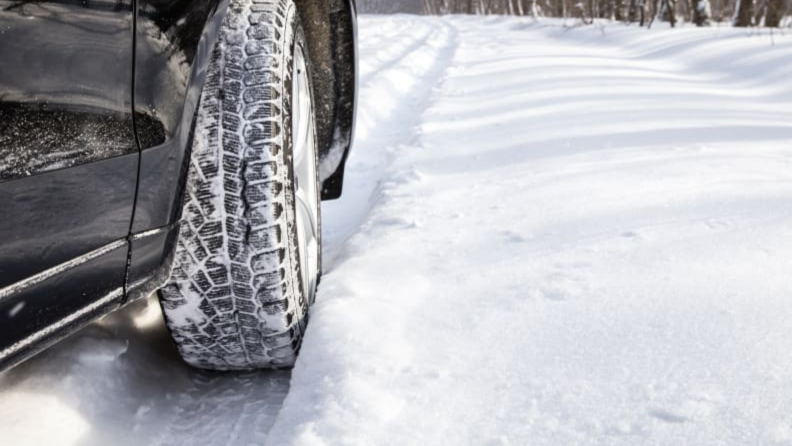 A close-up of a car tie in snow