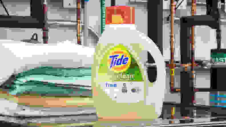 Eco-friendly laundry detergent sitting on top of a washer.
