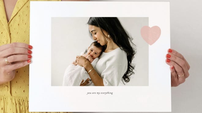 mom and baby in a white frame