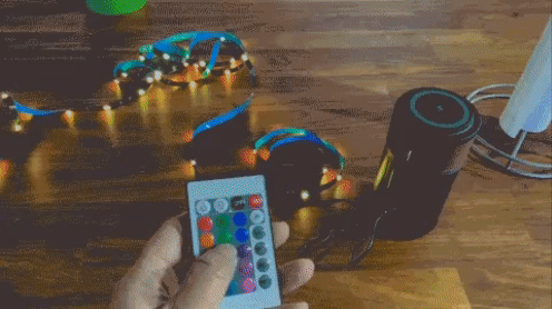 A remote changing the colors on a light strip