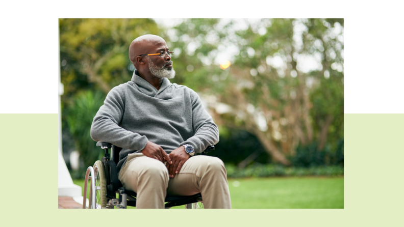 An old man sitting in a wheelchair.