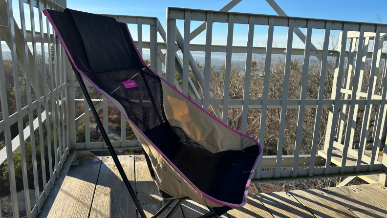 The chair with a view of the mountains in the back.
