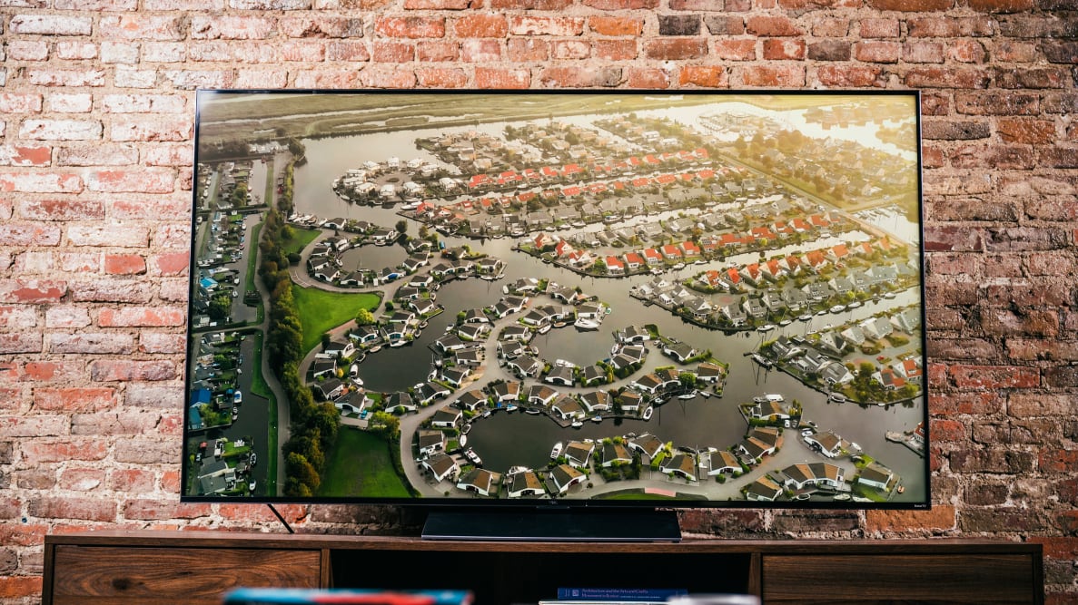 The 8K TCL 6-Series displaying HDR content in a living room setting